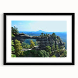 Colorful abstract art print of a European scenery in vibrant hues on a large textured canvas, ideal for living room decor.