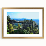 Abstract art print of Czech Republic scenery in muted earth tones on a framed gold mat, suitable for dining room decor.