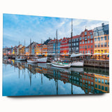 Large abstract depiction of a European cityscape in muted gray and blue tones on acrylic glass.