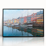 Large abstract wall art featuring a mid-century modernist depiction of a European scenery in black and white tones.