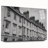 Acrylic glass print of a European cityscape in muted gray and blue tones, suitable for dining room decor.