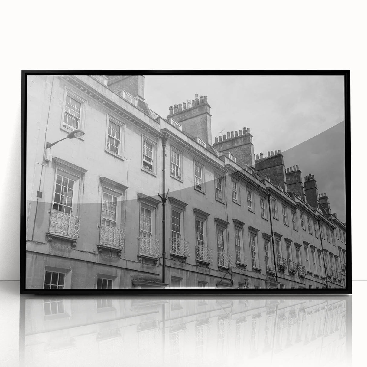 Large abstract wall art depicting a European scenery in Bath, England, with muted earth tones on a black framed acrylic.