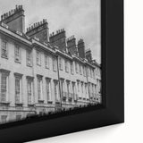 Black wall art of a textured European cityscape in vibrant colors on a framed canvas, ideal for living room decor.