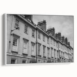 Vintage poster art of Bath, England, showing colorful buildings on a white framed canvas, ideal for living room decor.