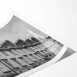 Extra large wall art featuring line art flowers in muted earth tones on a rolled canvas.