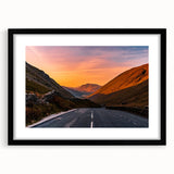 Extra large abstract art print of Cumbria landscape in vibrant colors on a textured canvas, framed in black.