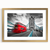 Abstract art print of London scenery in muted gold and blue tones, framed with a mat.