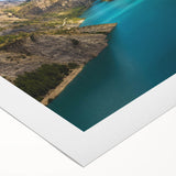 Art deco poster of the French Alps in muted blues and greens on rolled canvas, suitable for dining room wall art.