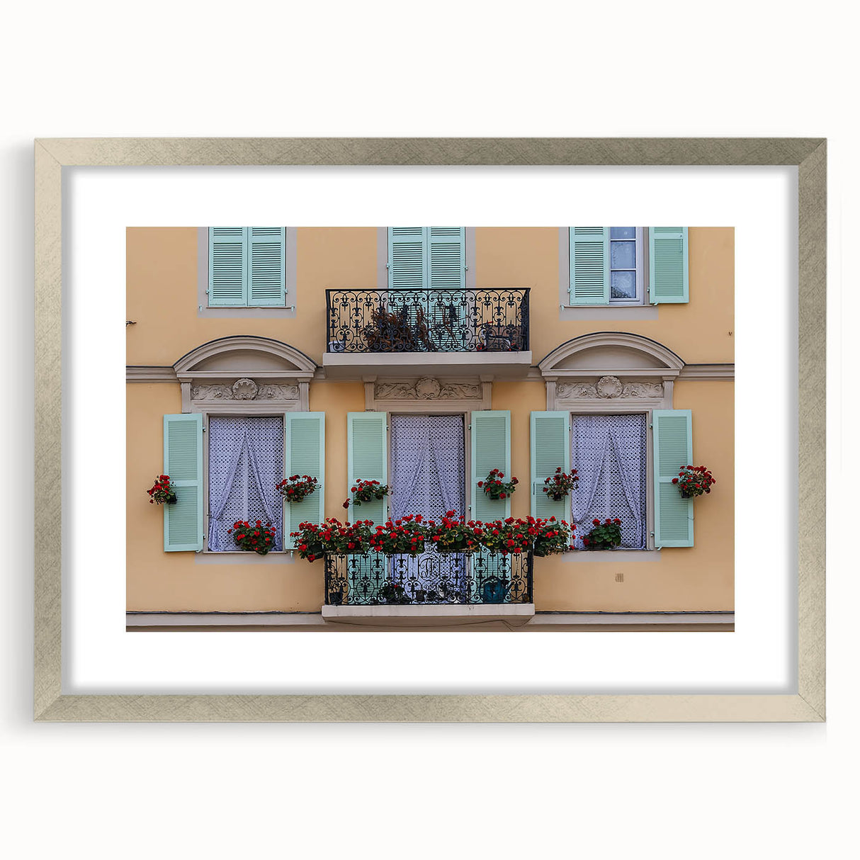 Extra large abstract art print of a textured European scenery in muted earth tones, framed in silver.
