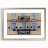 Extra large abstract art print of a textured European scenery in muted earth tones, framed in silver.