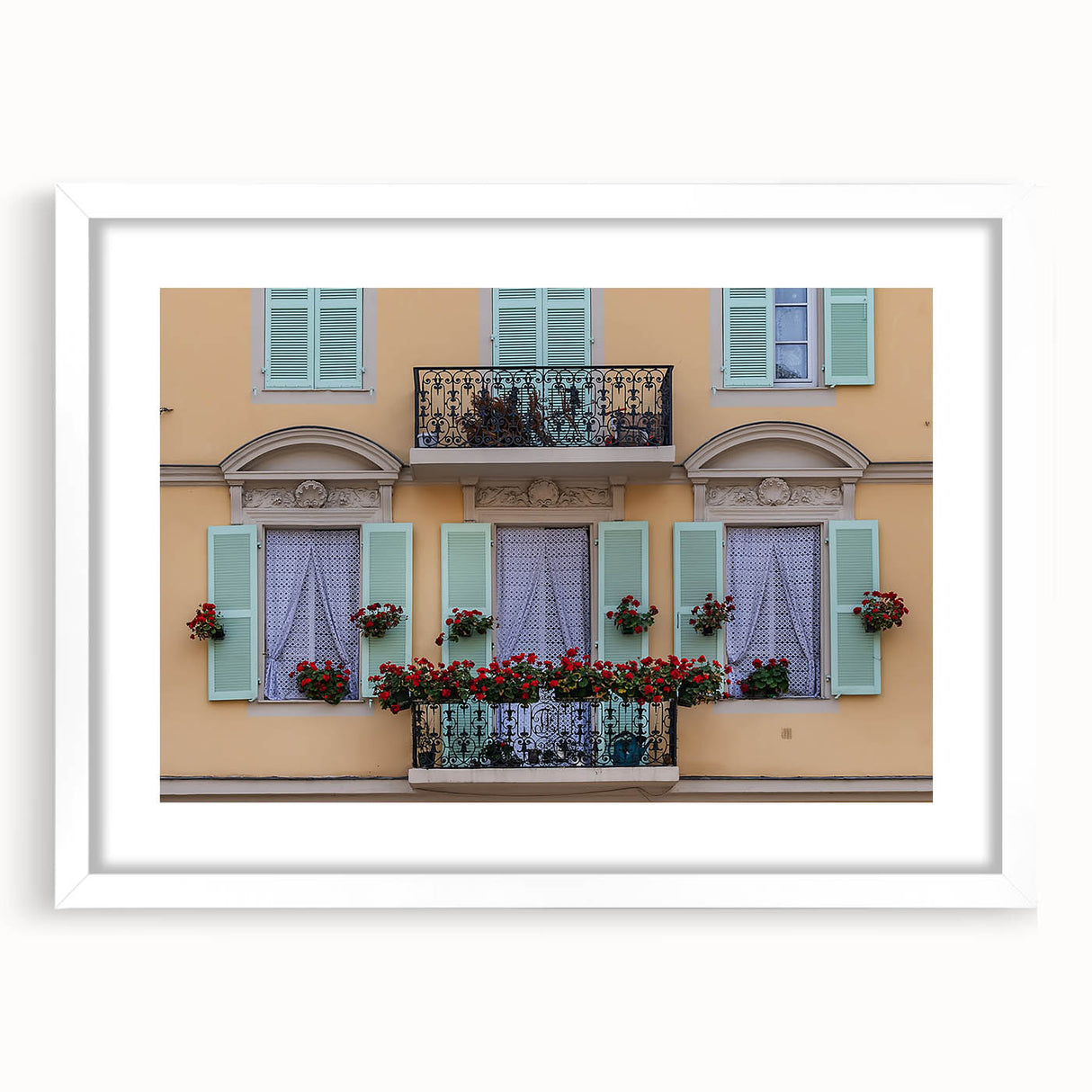 Textured art depicting an abstract European scenery in muted earth tones, framed with a white mat.