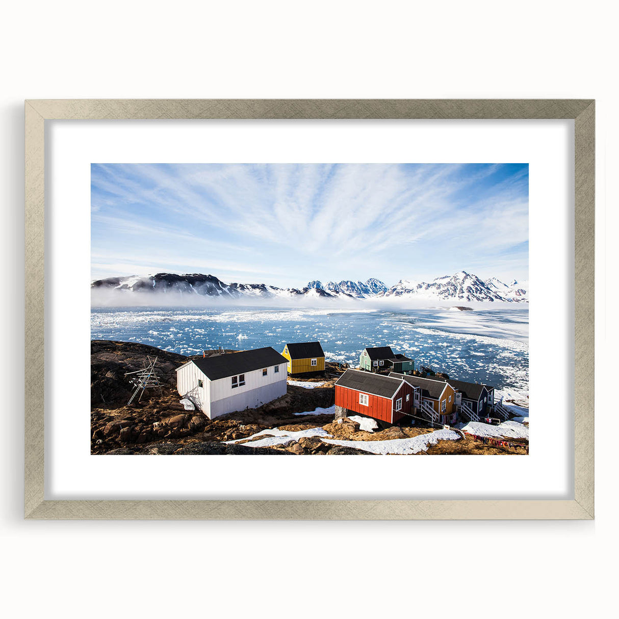 Extra large abstract art print of a textured Greenland scenery in muted green and blue tones, framed with a silver mat.