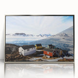 Large art print of a Greenlandic landscape in muted green and blue tones, framed in silver acrylic.