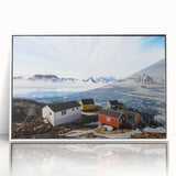 Mid-century modernist art depicting a Greenlandic landscape in muted green and blue tones, acrylic print in white frame.