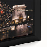 Black wall art featuring a textured depiction of a European scenery in vibrant colors on a large framed canvas.