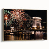 Framed canvas featuring a vintage-style landscape painting of a European scenery in black and gold tones.