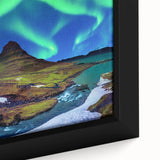 Black wall art featuring a textured Icelandic landscape in vibrant colors on a framed canvas, ideal for living room decor.