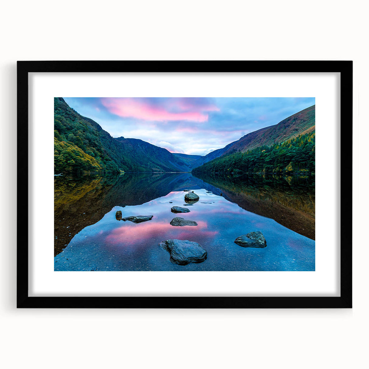 Abstract art print of a colorful Irish landscape in textured style, framed in black, ideal for living room decor.