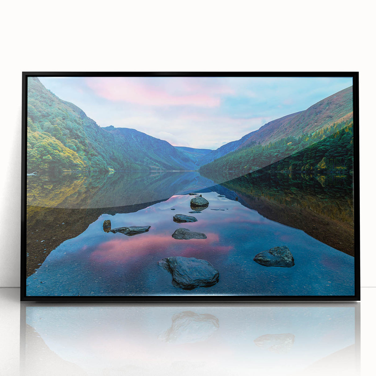 Large abstract wall art depicting a European Irish landscape in muted green and blue tones, framed in black acrylic.