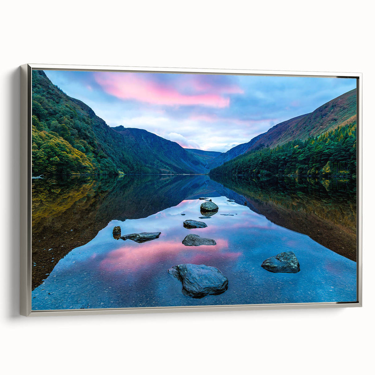 Framed canvas depicting a vintage style landscape of an Irish countryside in muted greens and blues.