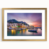 Abstract art print of Capri, Italy in muted blue and white tones on a framed canvas, suitable for dining room decor.