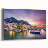 Framed canvas depicting a vintage-style landscape of Capri, Italy in muted gold and black tones.