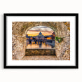 Abstract art print of colorful, textured scenery depicting Rome, framed in black, ideal for living room decor.