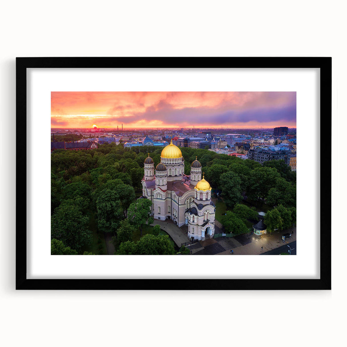 Extra large abstract art print depicting a colorful European landscape on a textured canvas, framed in black.