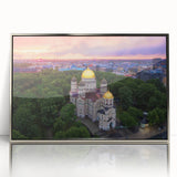 Acrylic print of a European landscape in Latvia, with muted earth tones, framed in silver.