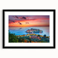 Colorful abstract art print of a Montenegro scenery, in a black frame with mat, ideal for living room decor.