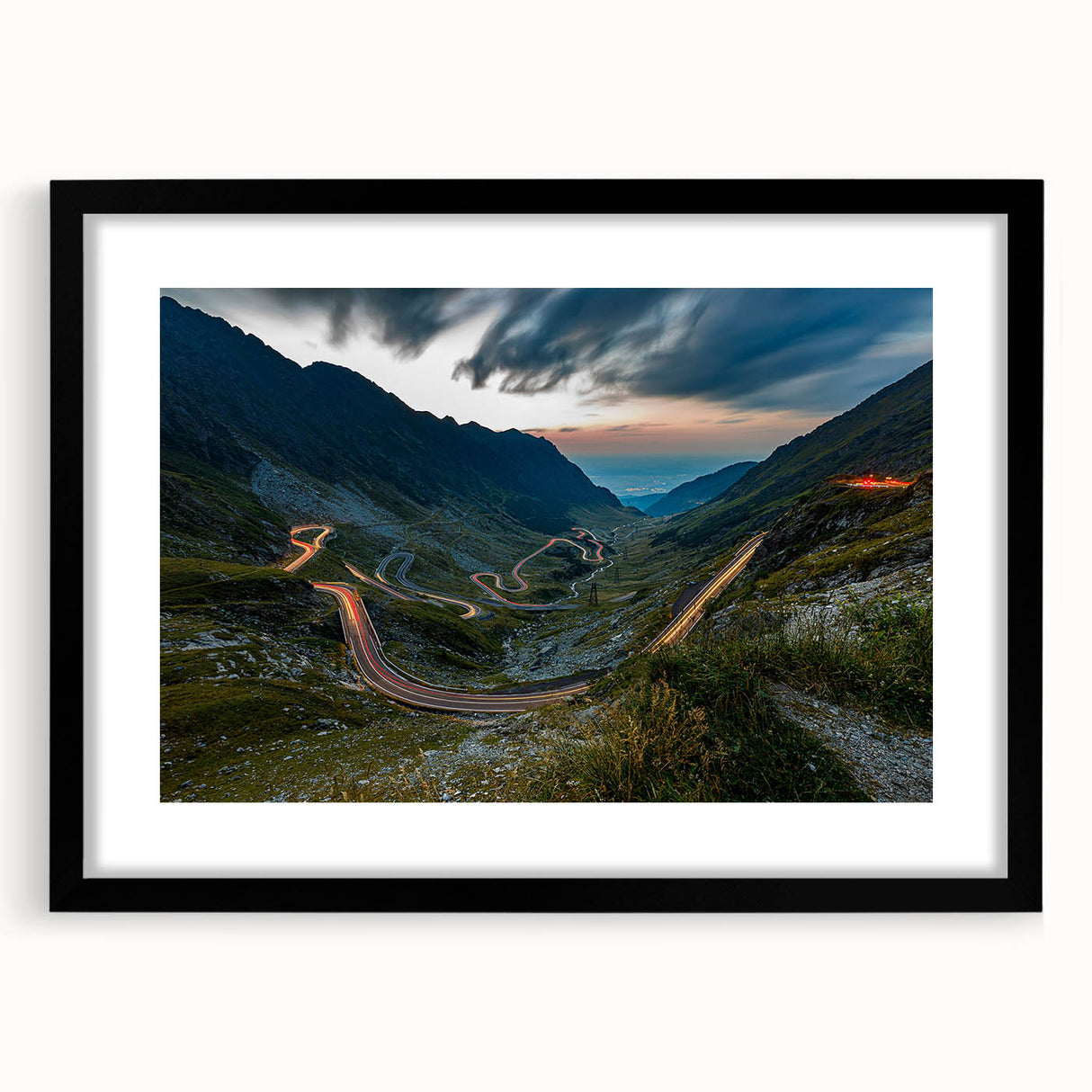 Abstract art print of a colorful, textured European scenery in a black frame, ideal for large living room walls.