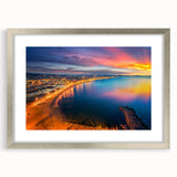 Extra large abstract art print of Barcelona scenery in muted earth tones on a textured canvas, framed in silver.