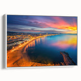 Vintage poster art of Barcelona scenery on a framed canvas, featuring a mix of colorful art and black accents.