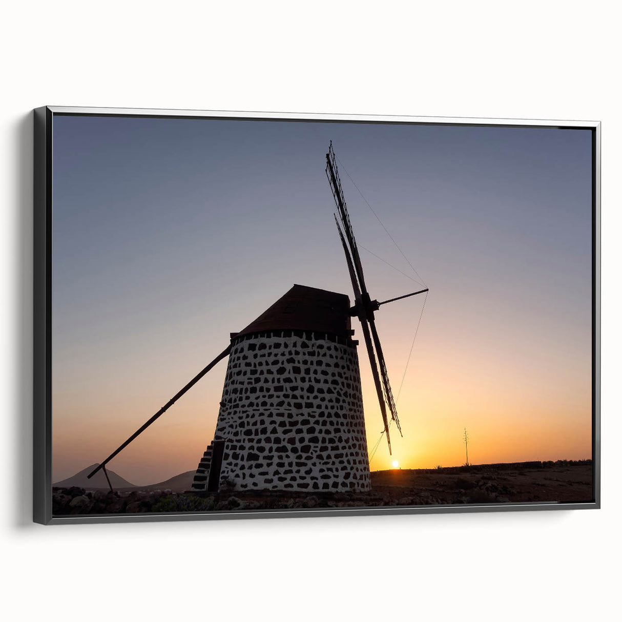 Black and white framed canvas of a vintage European landscape, ideal for bedroom wall decor.