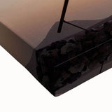 Large art featuring a black and white landscape painting of the Canary Islands on stretched canvas.