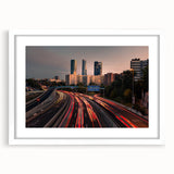 Abstract art print of Madrid with muted earth tones on a framed white mat, suitable for dining room decor.