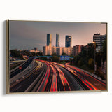 Framed canvas of a vintage-style Madrid landscape in black and gold tones, ideal for bedroom wall art.