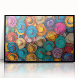 Large abstract wall art of Cancun scenery in muted blue and green tones, framed in black acrylic.