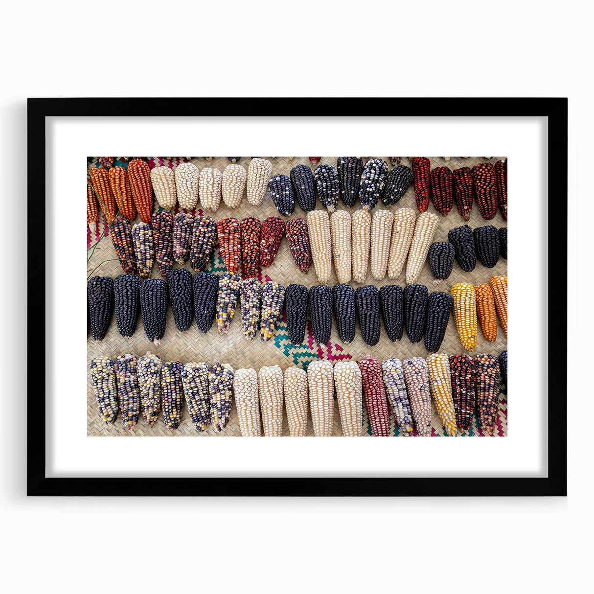 Abstract art print featuring a textured, colorful depiction of Oaxaca scenery in an extra-large black framed mat.
