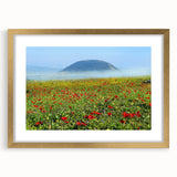 Extra large abstract art print depicting a Middle Eastern scenery in textured gold and earth tones on a framed canvas.