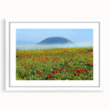 Abstract art print depicting a Middle Eastern landscape in muted earth tones, framed with a white mat.