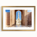 Extra large abstract art print featuring textured scenery of Oman in muted earth tones, framed in gold.