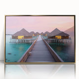 Large art print of Bora Bora's oceanic scenery in muted blue and green tones, framed in gold acrylic.