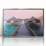 Mid-century modernist art depicting the serene waters and overwater bungalows of Bora Bora in pastel shades on a framed…
