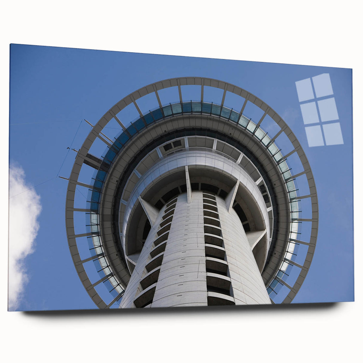 Large abstract wall art of Auckland skyline in muted blue and gray tones on acrylic glass.