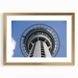 Extra large textured abstract art print depicting Auckland's oceanic scenery in muted blues and greens on a gold-framed…