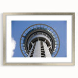 Textured abstract art print of Auckland skyline in muted blues and greys on a framed canvas, suited for bedroom art.