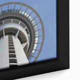Extra large framed canvas featuring a textured depiction of Auckland's skyline in black with colorful art accents.
