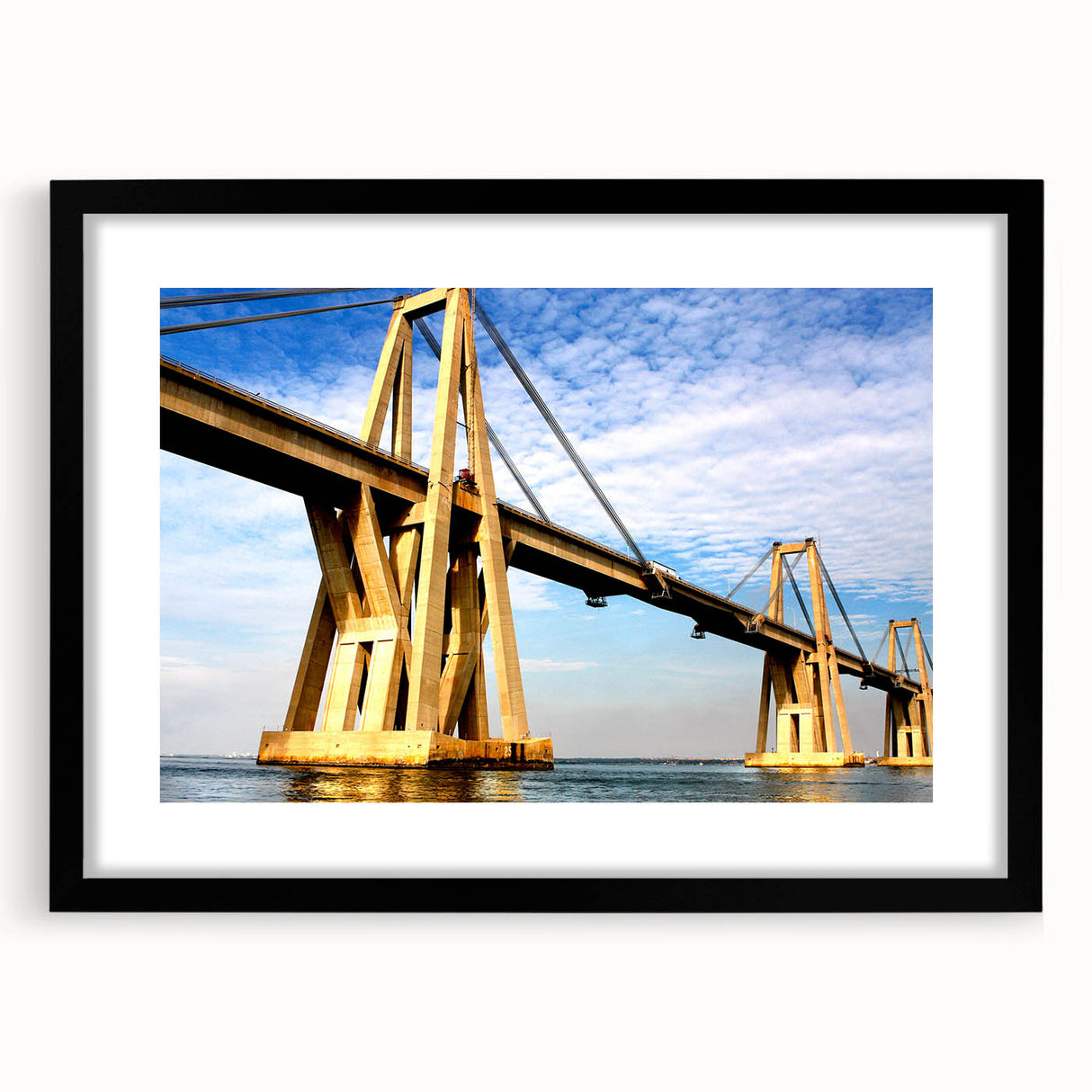 Extra large abstract art print featuring vibrant, colorful textured scenery of South America on a framed black mat.