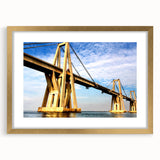 Extra large abstract art print of Venezuelan scenery in muted earth tones on a textured canvas, framed in gold.